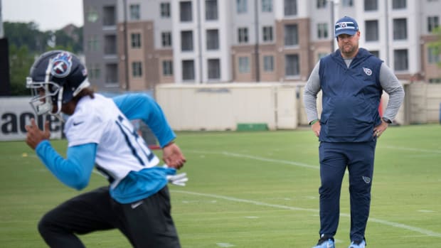Titans general manager Jon Robinson watches wide receiver Josh Reynolds (18) during practice at Saint Thomas Sports Park Thursday, June 10, 2021 in Nashville, Tenn.